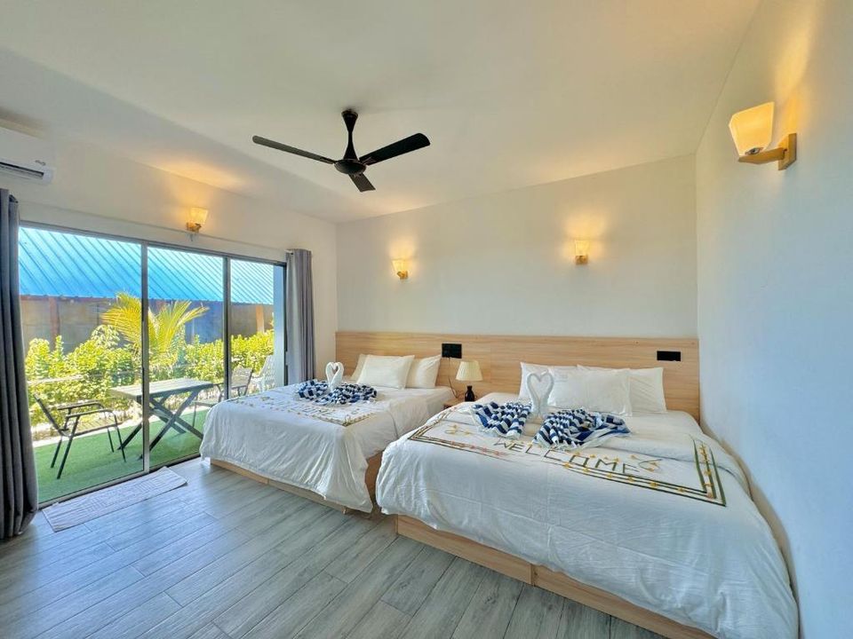 Family villa room with two double beds